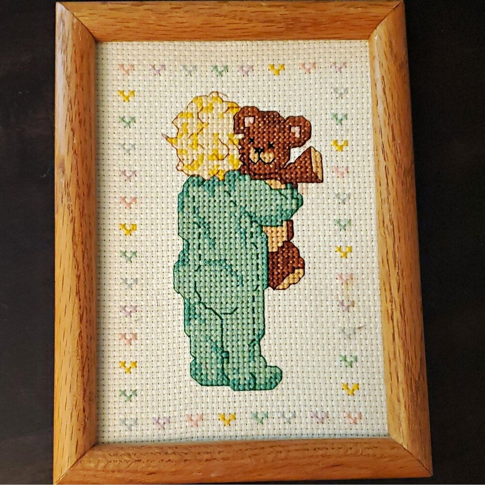 Framed Cross Stitch Needlepoint Artwork - Child in Green Pajamas Holding Teddy
